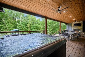 Hot tub on the patio of a cabin in Hochatown, Okalhoma